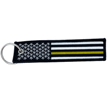 Load image into Gallery viewer, Thin Gold Line Police Flag Law Enforcement Keychain or Luggage Tag or zipper pull 911 Dispatcher Emergency LAPD NYPD CC-010 LKC-03 - www.ChallengeCoinCreations.com