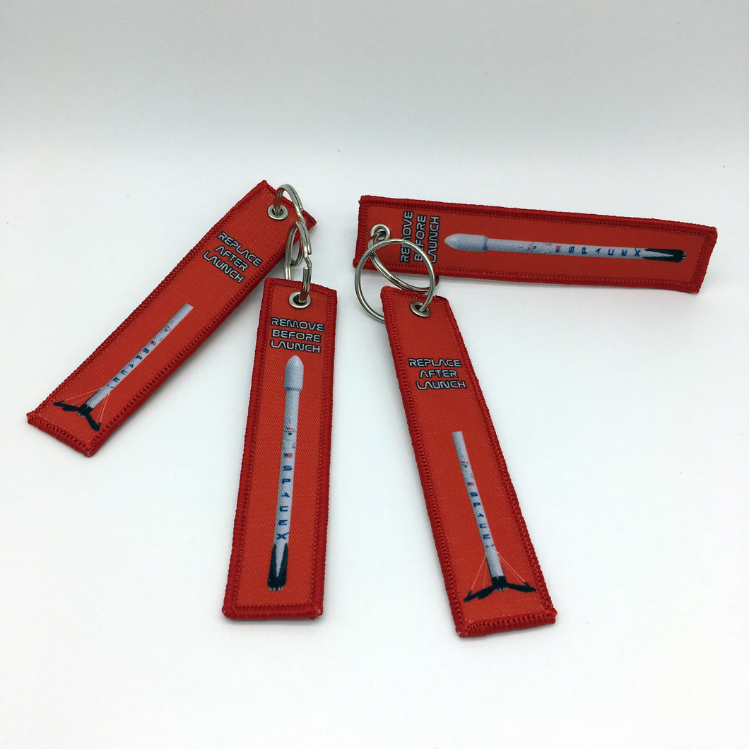 Red Spacex Keychain or Luggage Pull Remove Before Launch Replace After Launch LKC-17 - www.ChallengeCoinCreations.com