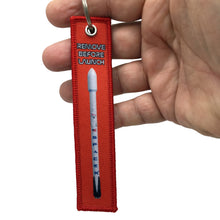 Load image into Gallery viewer, Red Spacex Keychain or Luggage Pull Remove Before Launch Replace After Launch LKC-17 - www.ChallengeCoinCreations.com