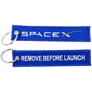 Space X REMOVE BEFORE LAUNCH blue Keychain or Luggage Tag or zipper pull SpaceX EL10-008 LKC-08 - www.ChallengeCoinCreations.com