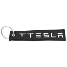 Load image into Gallery viewer, Tesla 3 X S Y REMOVE BEFORE LAUNCH Keychain or Luggage Tag or black zipper pull SpaceX EL5-020 LKC-16 - www.ChallengeCoinCreations.com