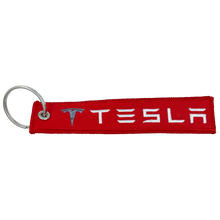 Load image into Gallery viewer, Tesla 3 X S Y REMOVE BEFORE LAUNCH Keychain or Luggage Tag or red zipper pull SpaceX EL6-020 LKC-15 - www.ChallengeCoinCreations.com