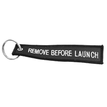 Load image into Gallery viewer, Tesla 3 X S Y REMOVE BEFORE LAUNCH Keychain or Luggage Tag or black zipper pull SpaceX EL5-020 LKC-16 - www.ChallengeCoinCreations.com